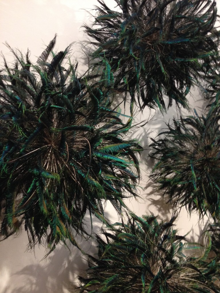 ...renowned for its textiles collection. “Caryatids” (peacock feathers) by Susie MacMurray, 2004.